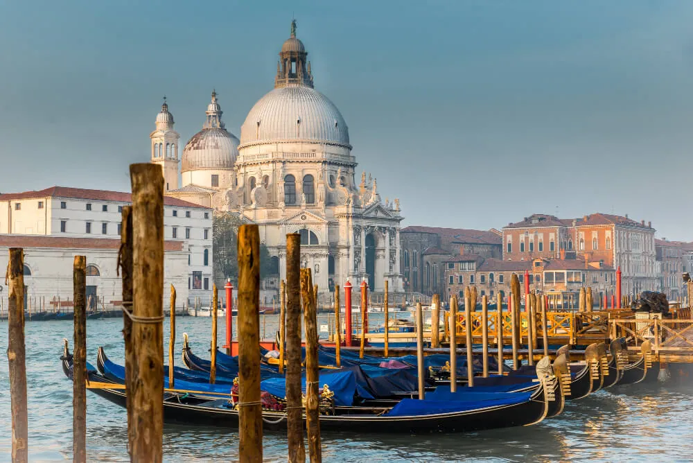Gondolas on the Grand Canal below the Santa Maria della Salute basilica, Venice, Italy